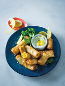 Curried fish spring rolls