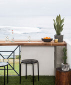 Homemade wooden table and building blocks on the balcony