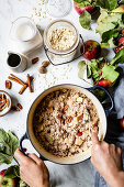 Oatmeal with apple, cinnamon and pecans for breakfast