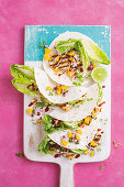 Vegan tacos with orange salsa