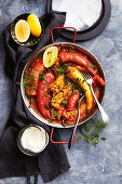 One-pan haloumi and rice-stuffed peppers