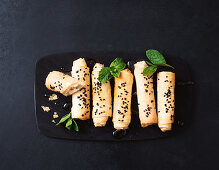 Vegetarian filo pastry rolls with sheep's cheese filling