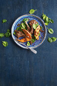 Maple-glazed lamb and sweet potato tray bake