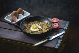 Bubble and squeak with fried eggs (England)