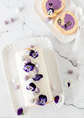 Blueberry Swiss roll with pansies