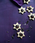 Vegan vanilla stars with redcurrant and apricot jam and pumpkin seeds