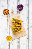 Vegetarian jackfruit tacos with sweetcorn, red cabbage and coriander