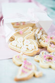 Easter biscuits decorated with icing and silver balls