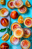 Muffins with slices of red orange