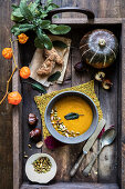 Vegan pumpkin soup with cripy sage leaves as a garnish