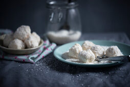 Vegan snowballs (biscuits with soy butter cream and grated coconut)