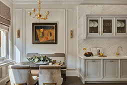 Luxurious kitchen-dining room in shades of grey