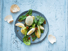 Marbled eggs on a bed of salad