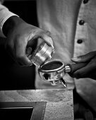 A barista preparing espresso