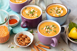 Red lentils and sweet potatoes cream sup with coconut milk
