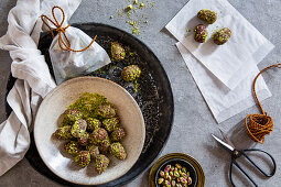 Easter eggs coated in dates, cocoa and pistachios as a gift