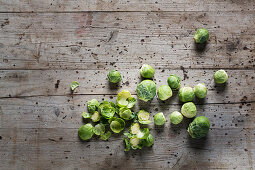 Fresh Brussels sprouts on a wooden surface