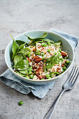 Millet salad with peas and spinach