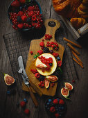 A dessert tartlet with summer berries and figs