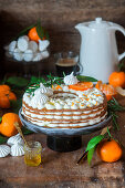 Layer honey cake with tangerines