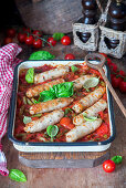 Chicken sausages with vegetables and tomato sauce