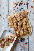 Homemade granola bars with nuts, kernels and berries