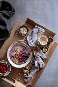 A breakfast bowl with frozen yoghurt and superfood toppings (low carb)