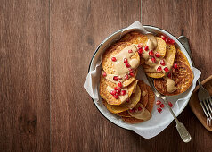 Coconut and rice-flour flapjacks with tahini 'caramel' sauce