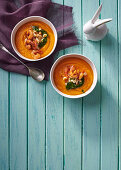Carrot, parsnip, beer and ginger soup with spicy prawns