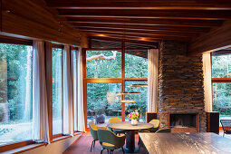 Open-plan kitchen-dining area in sustainable, architect-designed house