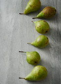 Pears on a grey board