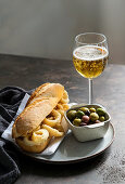 Bocadillo con calamares or squid sandwich with beer, very popular in Madrid spanish typical tapas