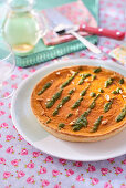 Carrot and coconut tart with coriander pesto and peanuts