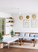 Simple living room in natural tones with wooden furniture