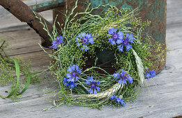 Cornflower with ears of rye wreath with grasses