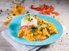 Chicken curry with red pepper, long grain rice and chili (Asia)