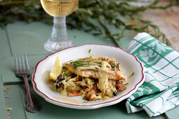 Fisch mit Sauerkraut in Weissweinsauce (Elsass)