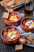 Baked egg with chorizo, pepper and tomato