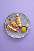 Skewers with salmon, scallops and honey mustard dip