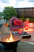 Fire bowl in cosy seating area on terrace