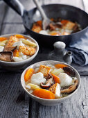 Hearty fish stew with mushrooms and carrots (Asia)