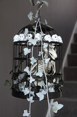 DIY Halloween decoration: bird skeleton in cage