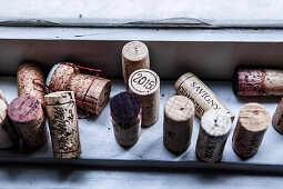 Wine corks on a window sill