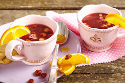 Swedish alcohol-free hazelnut punch with oranges, sultanas, raspberry tea and honey