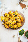 Spring onion bhajis with zhoug for Christmas