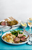 Mustard Herb Crusted Lamb Rack with beans and potatoes