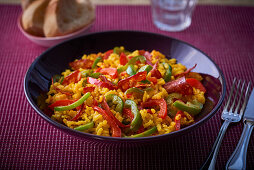 Paella with saffron, chorizo and peppers