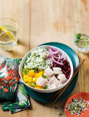 Hake poke bowl with green coconut rice