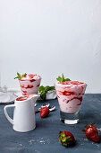 Strawberry mousse in a glass with strawberry sauce
