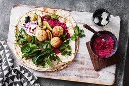 Cauliflower falafel wraps with beetroot hummus